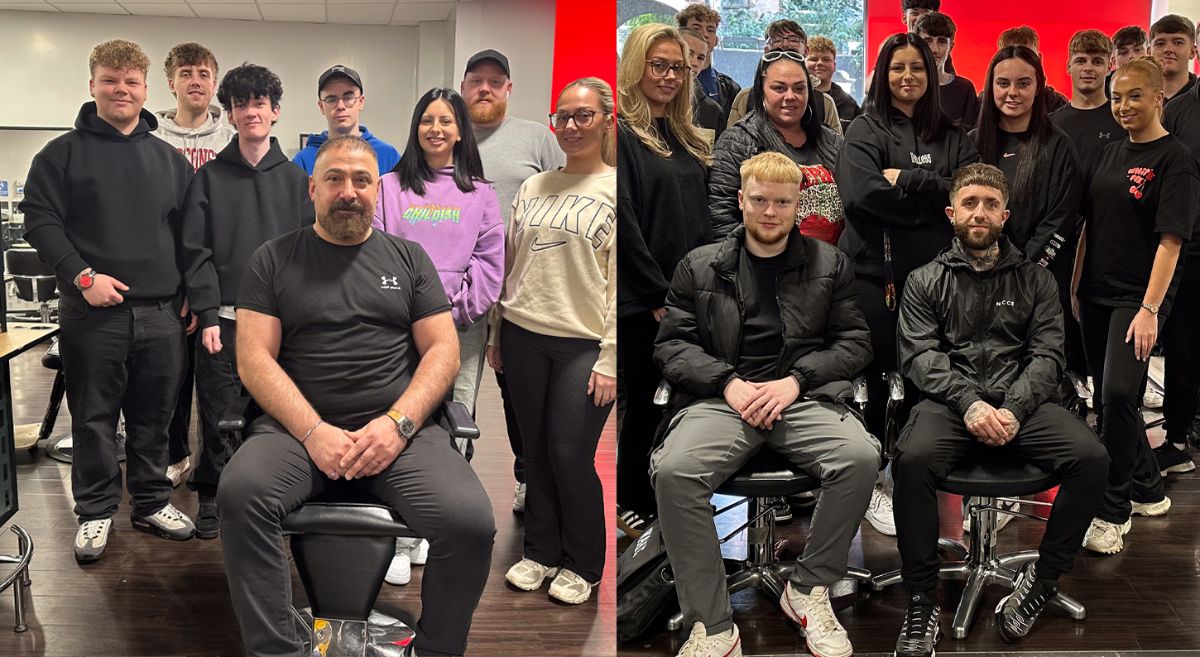 Picture of SERC Barbering alumni surrounded by SERC Barbering students